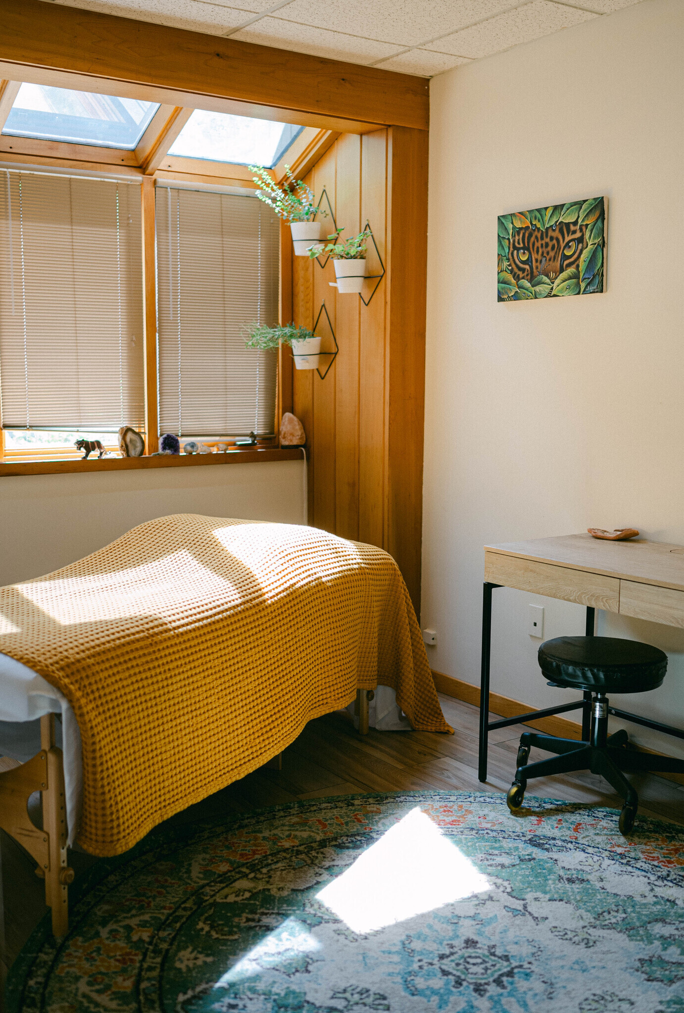 Serene treatment room for therapeutic bodywork, massage, and restorative practices that promote whole-body healing.